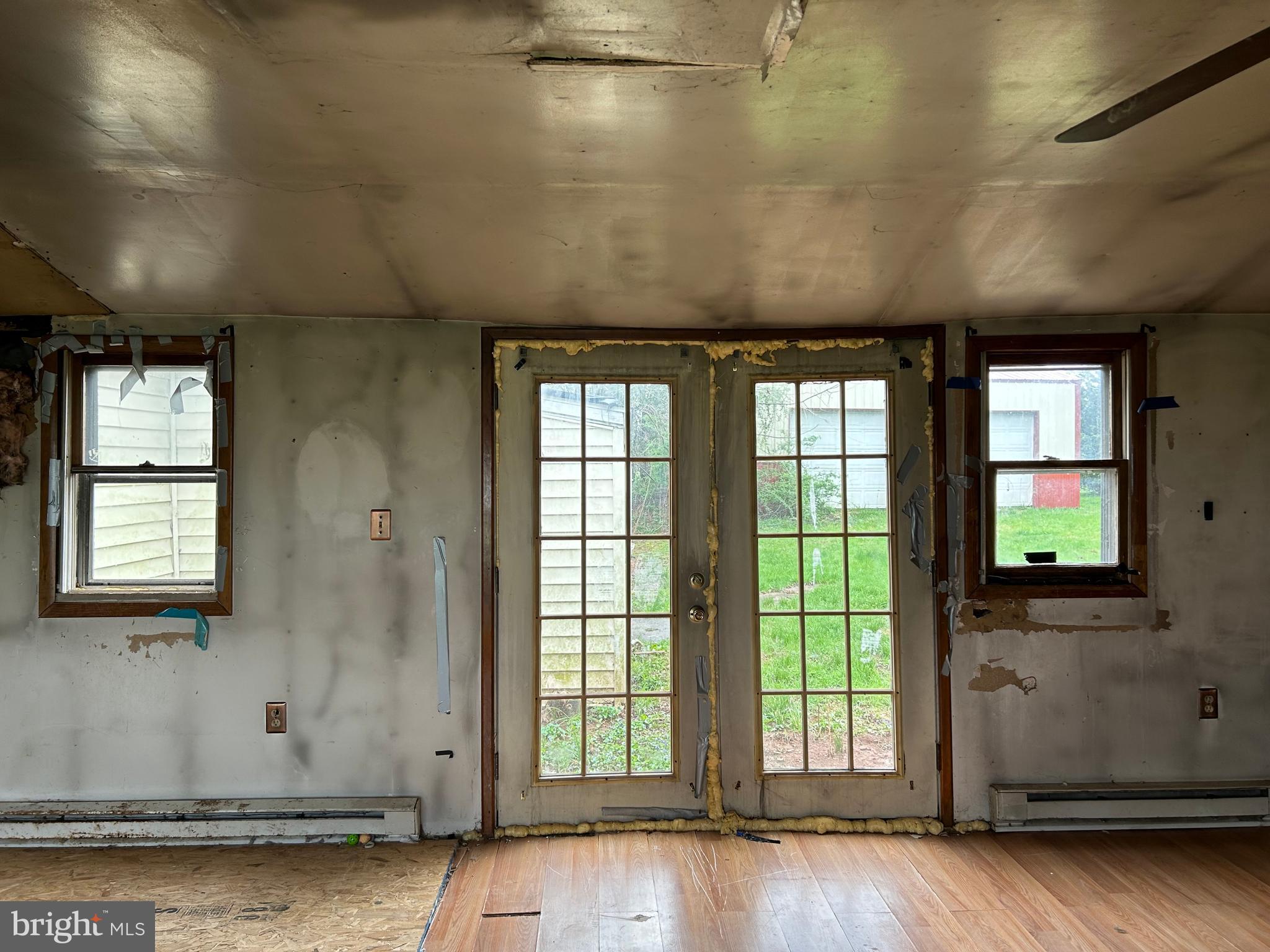 12632 Creagerstown Road Thurmont, MD 21788 - Photo 15 of 16 a view of a room with wooden floor and windows