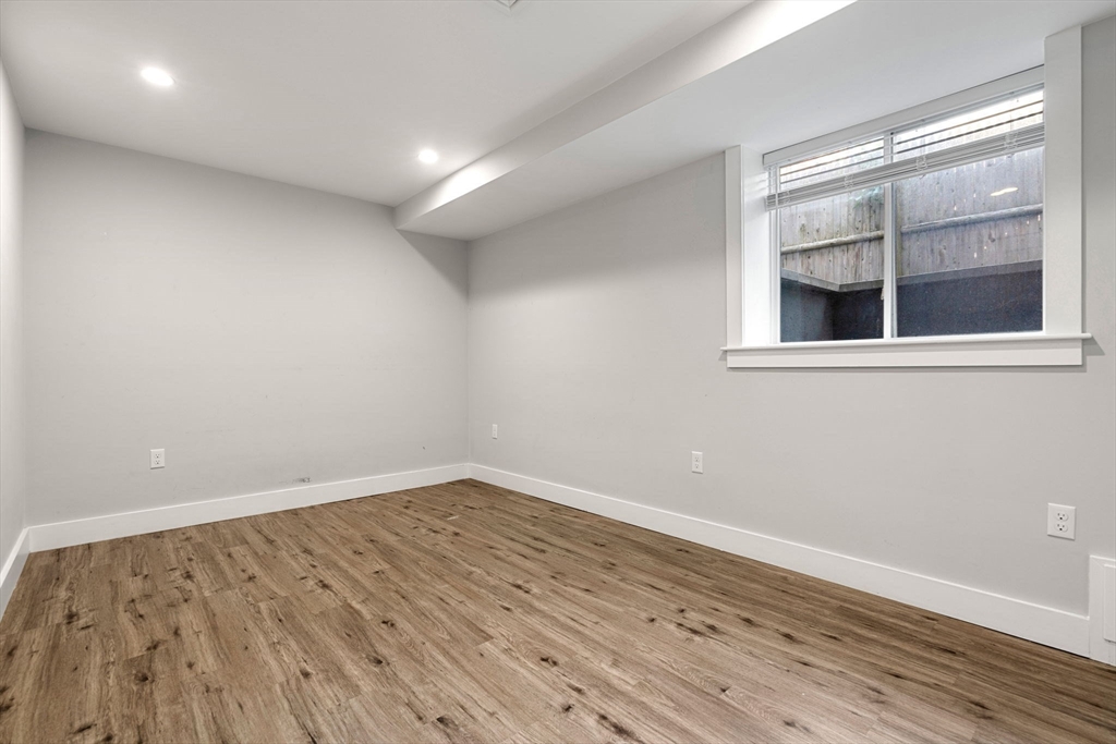 4 Crossman Street, Unit 4 Boston, MA 02126 - Photo 20 of 22 wooden floor in a room