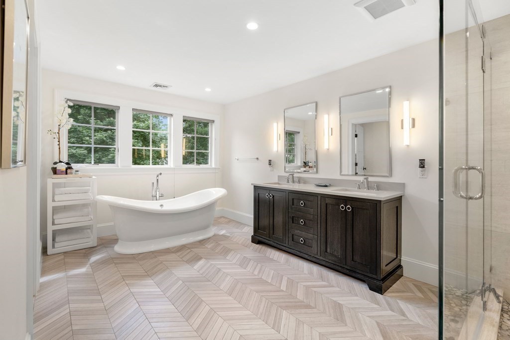15 Parker Road Needham, MA 02494 - Photo 18 of 41 a spacious bathroom with a tub sink and mirror