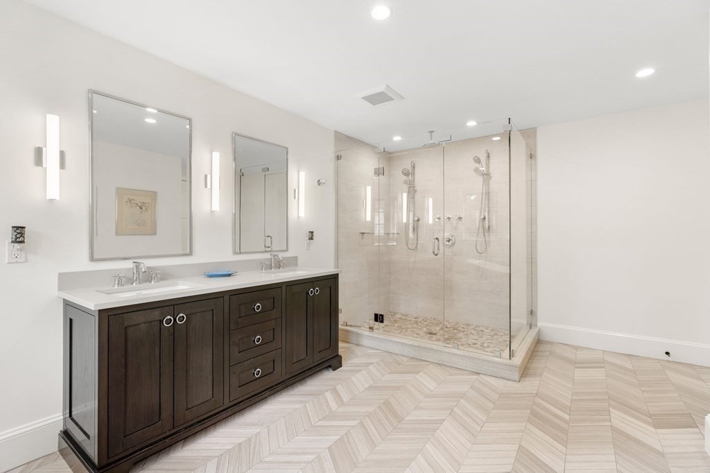 15 Parker Road Needham, MA 02494 - Photo 19 of 41 a bathroom with a granite countertop sink mirror and shower