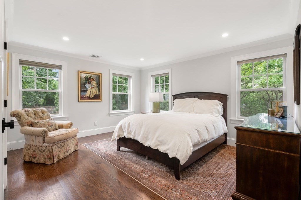 15 Parker Road Needham, MA 02494 - Photo 20 of 41 a bed room with a bed and a couch