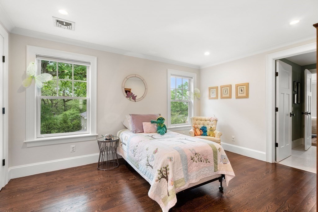 15 Parker Road Needham, MA 02494 - Photo 21 of 41 a bedroom with a bed and a large window