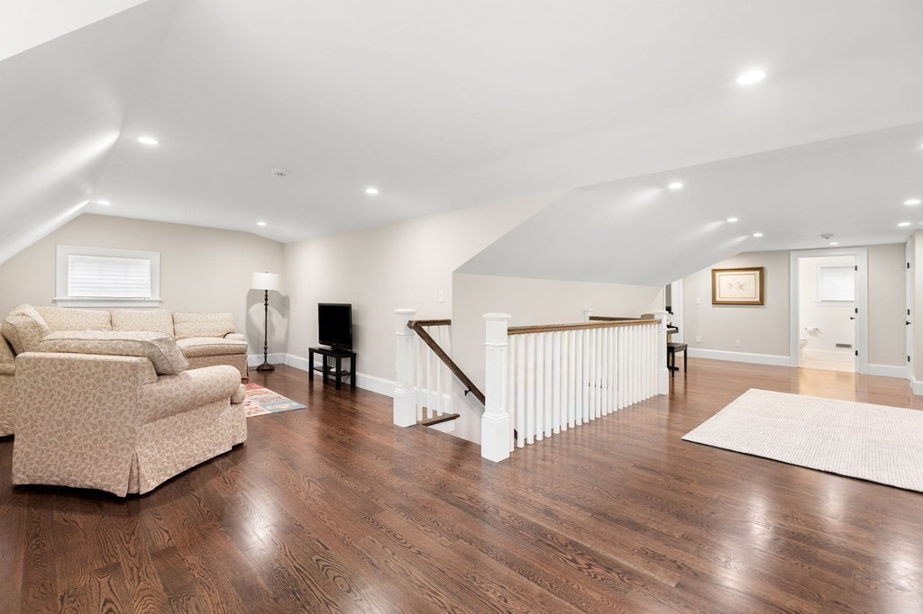 15 Parker Road Needham, MA 02494 - Photo 27 of 41 a living room with furniture and a wooden floor