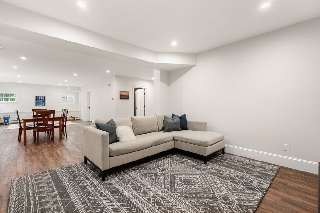 15 Parker Road Needham, MA 02494 - Photo 31 of 41 a living room with furniture and a wooden floor