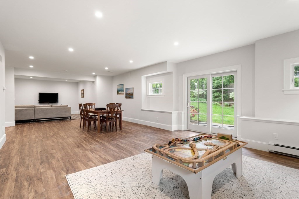 15 Parker Road Needham, MA 02494 - Photo 32 of 41 a living room with furniture and window with wooden floor