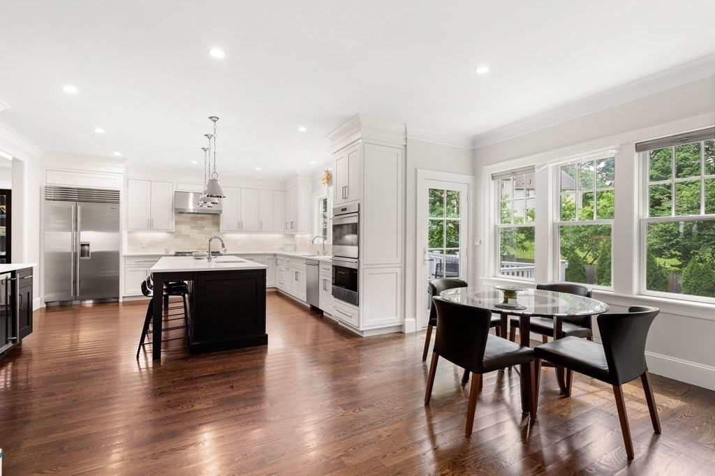15 Parker Road Needham, MA 02494 - Photo 5 of 41 a living room with stainless steel appliances kitchen island granite countertop furniture and a large window