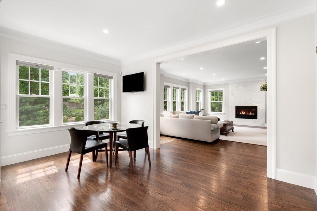 15 Parker Road Needham, MA 02494 - Photo 6 of 41 a dining room with furniture and wooden floor