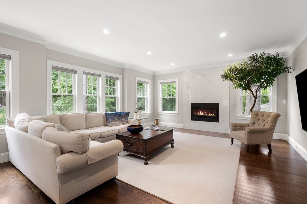 15 Parker Road Needham, MA 02494 - Photo 7 of 41 a living room with furniture and a fireplace