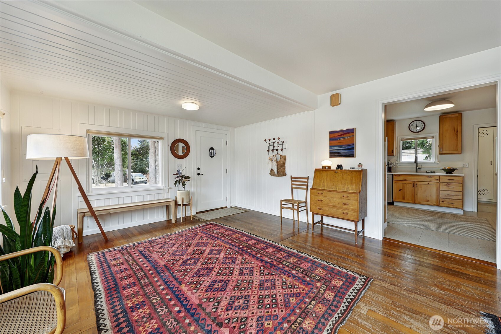16003 15th Avenue Southwest Burien, WA 98166 - Photo 24 of 36 a living room with furniture and a wooden floor