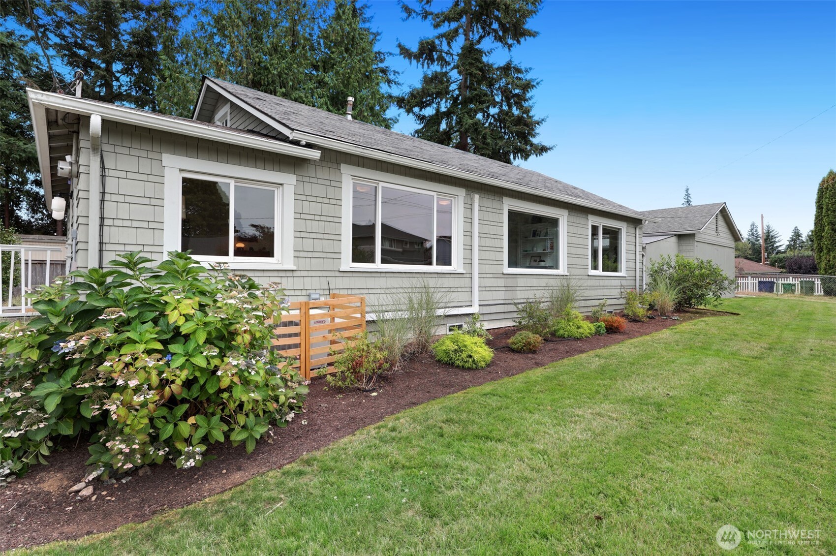 16003 15th Avenue Southwest Burien, WA 98166 - Photo 36 of 36 a front view of a house with garden
