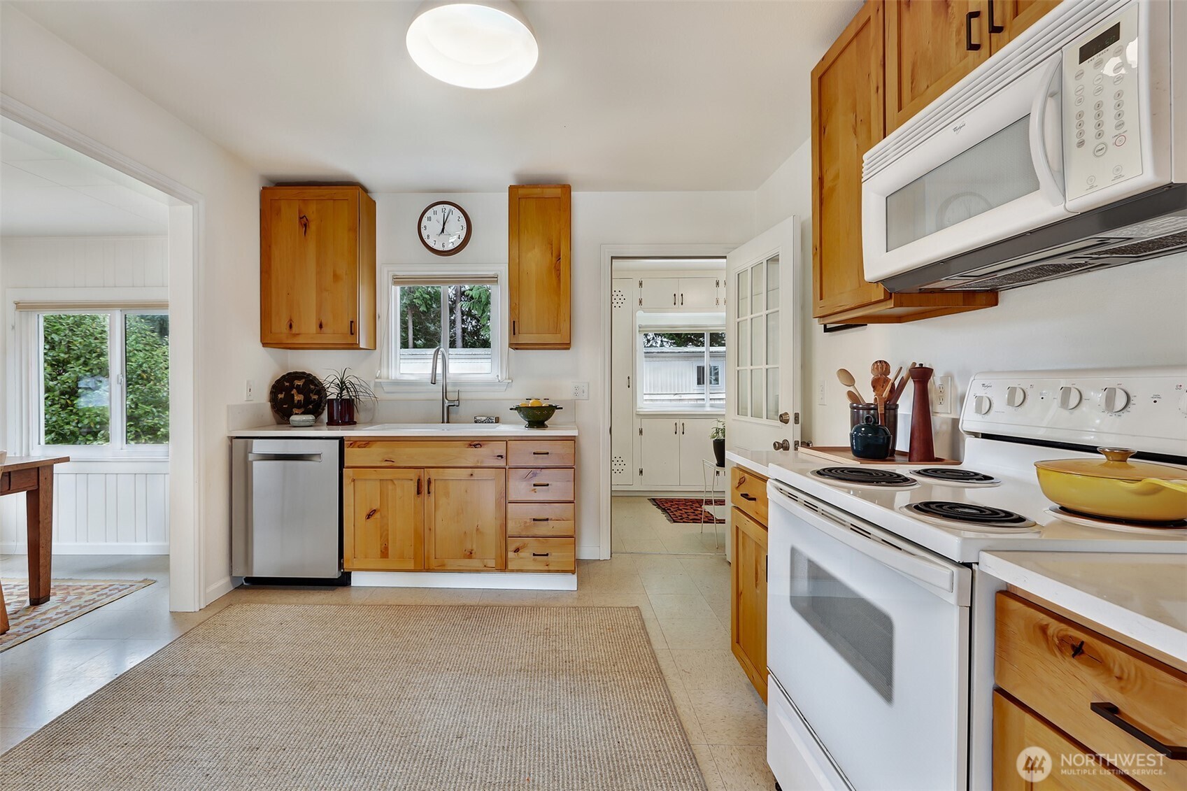 16003 15th Avenue Southwest Burien, WA 98166 - Photo 5 of 36 a kitchen with stainless steel appliances granite countertop a stove and a sink