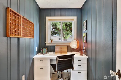 a bathroom with a sink vanity and a mirror