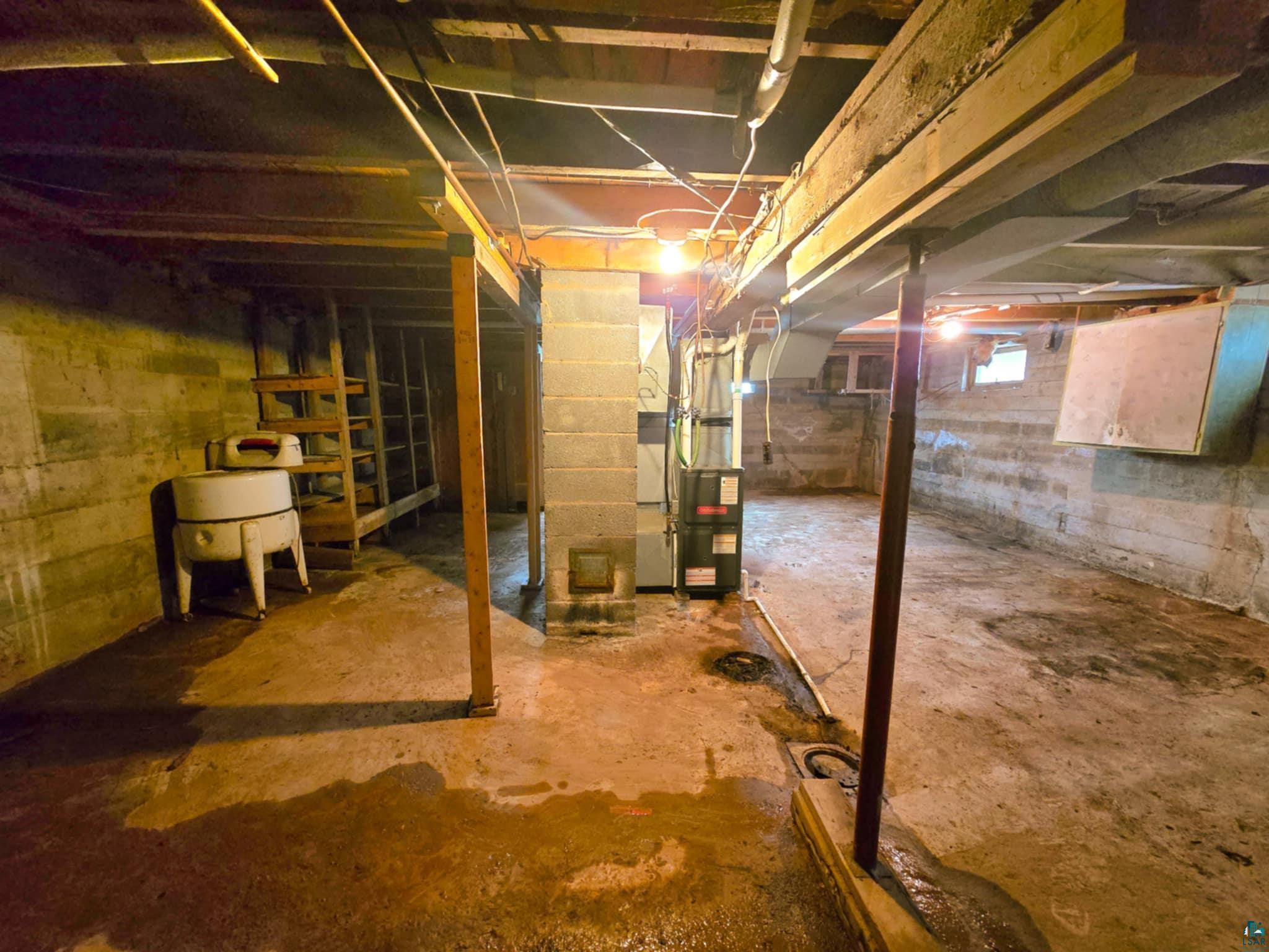 66282 County Rd C Marengo, WI 54855 - Photo 19 of 31 Basement featuring heating unit