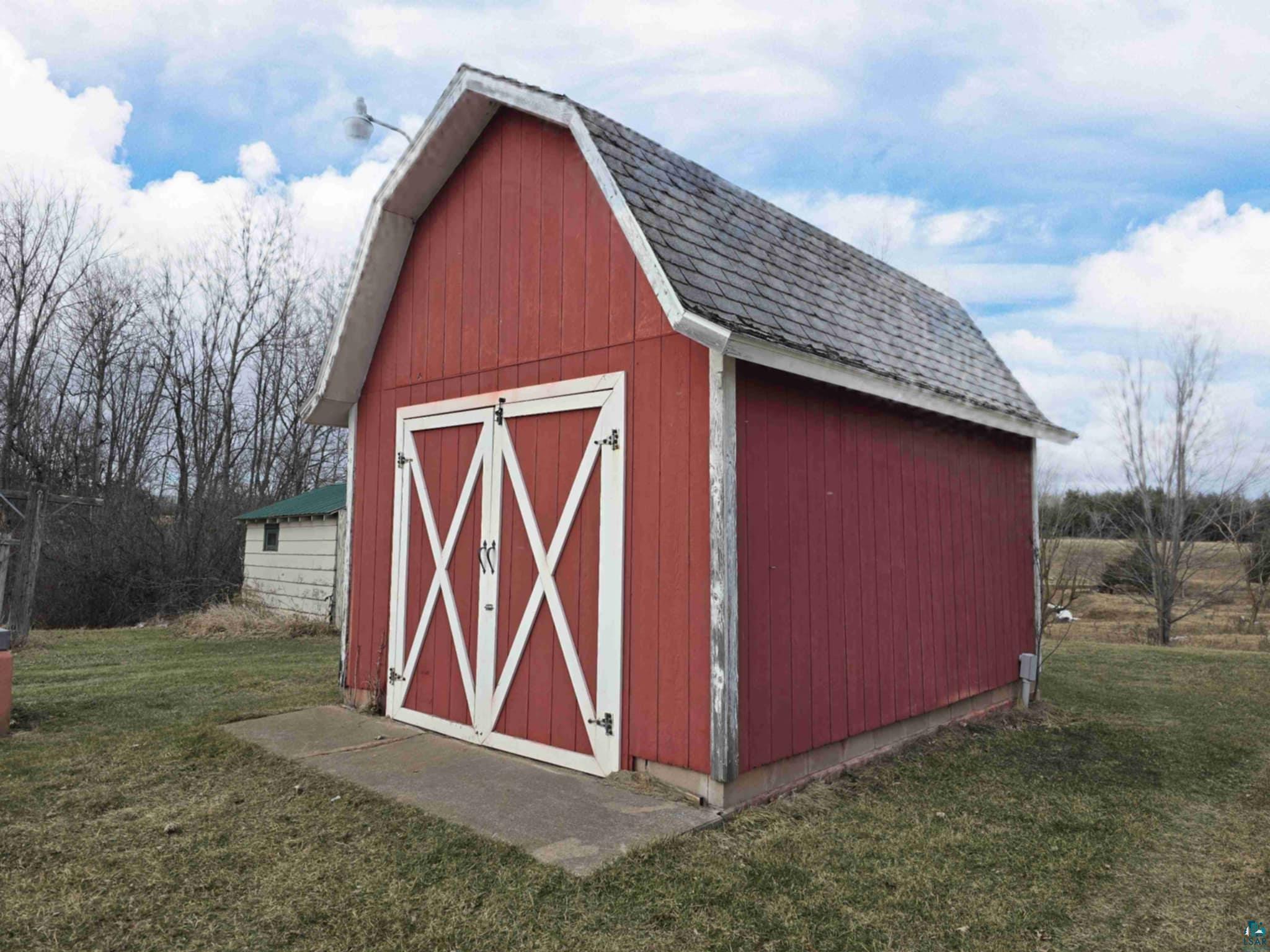 66282 County Rd C Marengo, WI 54855 - Photo 27 of 31 View of outdoor structure with a lawn