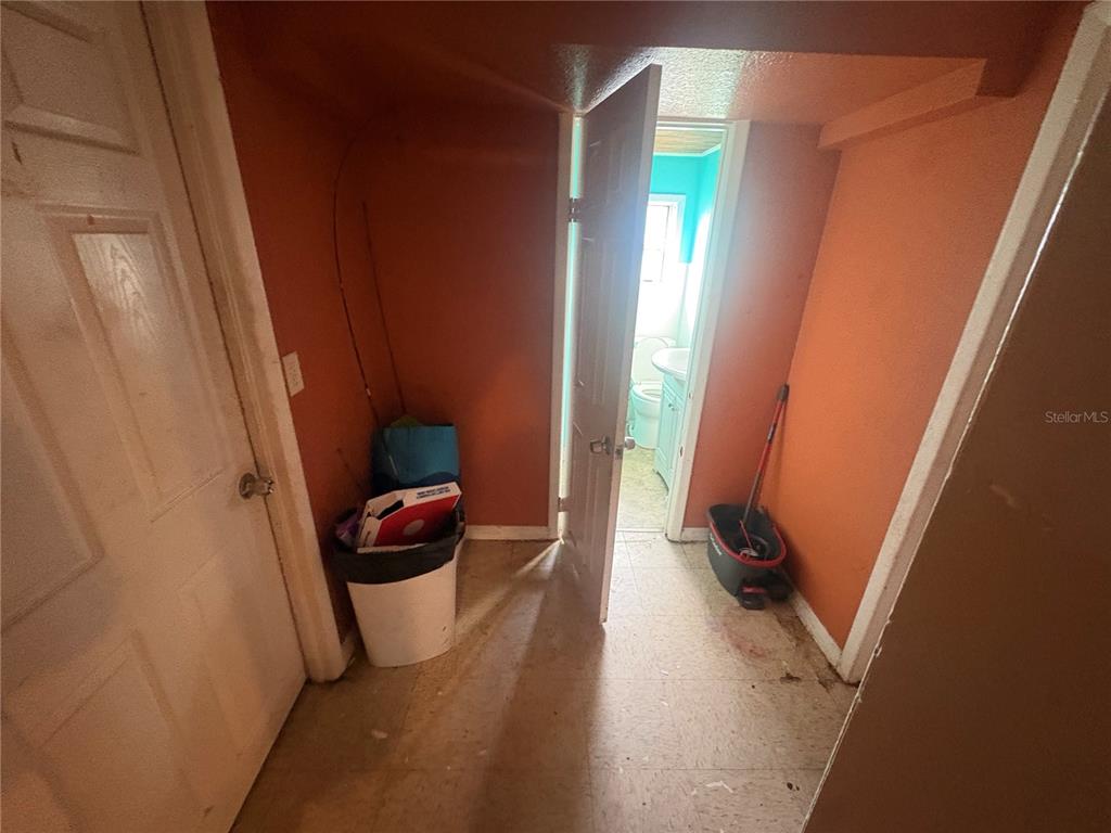 2330 Azalea Court Lakeland, FL 33815 - Photo 11 of 37 a view of a hallway and interior of the house