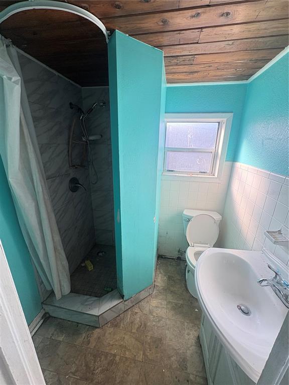 2330 Azalea Court Lakeland, FL 33815 - Photo 12 of 37 a bathroom with a sink and toilet