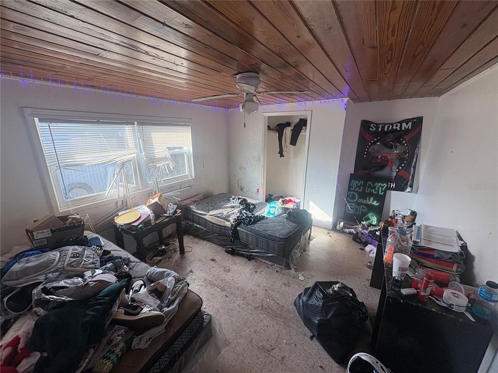 2330 Azalea Court Lakeland, FL 33815 - Photo 13 of 37 a living room with furniture and a window