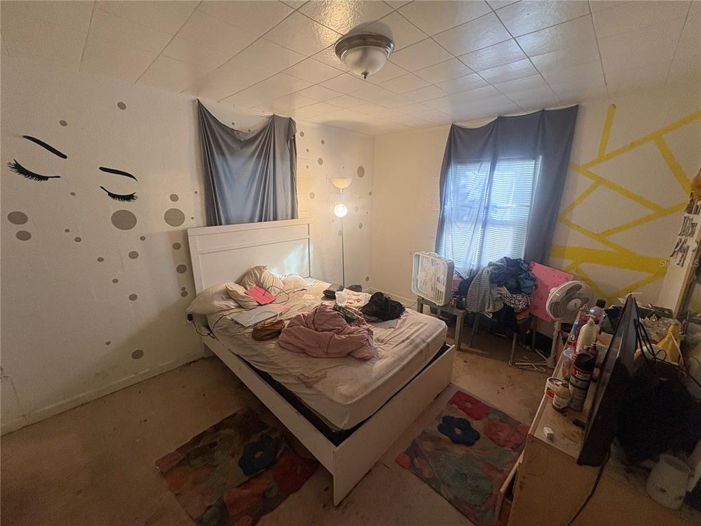 2330 Azalea Court Lakeland, FL 33815 - Photo 19 of 37 a living room with furniture and a rug