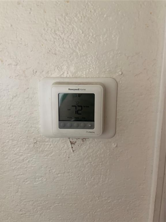 2330 Azalea Court Lakeland, FL 33815 - Photo 23 of 37 a bathroom with a sink and a stove