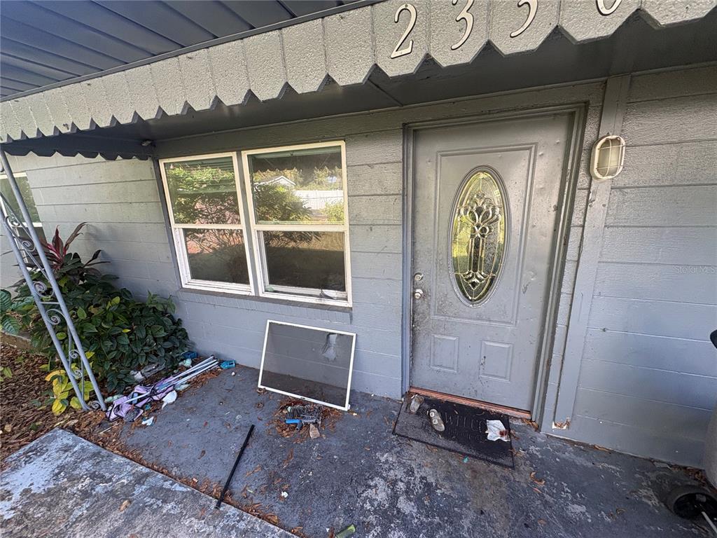 2330 Azalea Court Lakeland, FL 33815 - Photo 24 of 37 a front view of a house with entryway