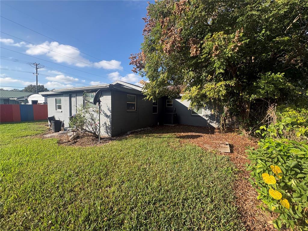 2330 Azalea Court Lakeland, FL 33815 - Photo 33 of 37 a view of a house with a yard