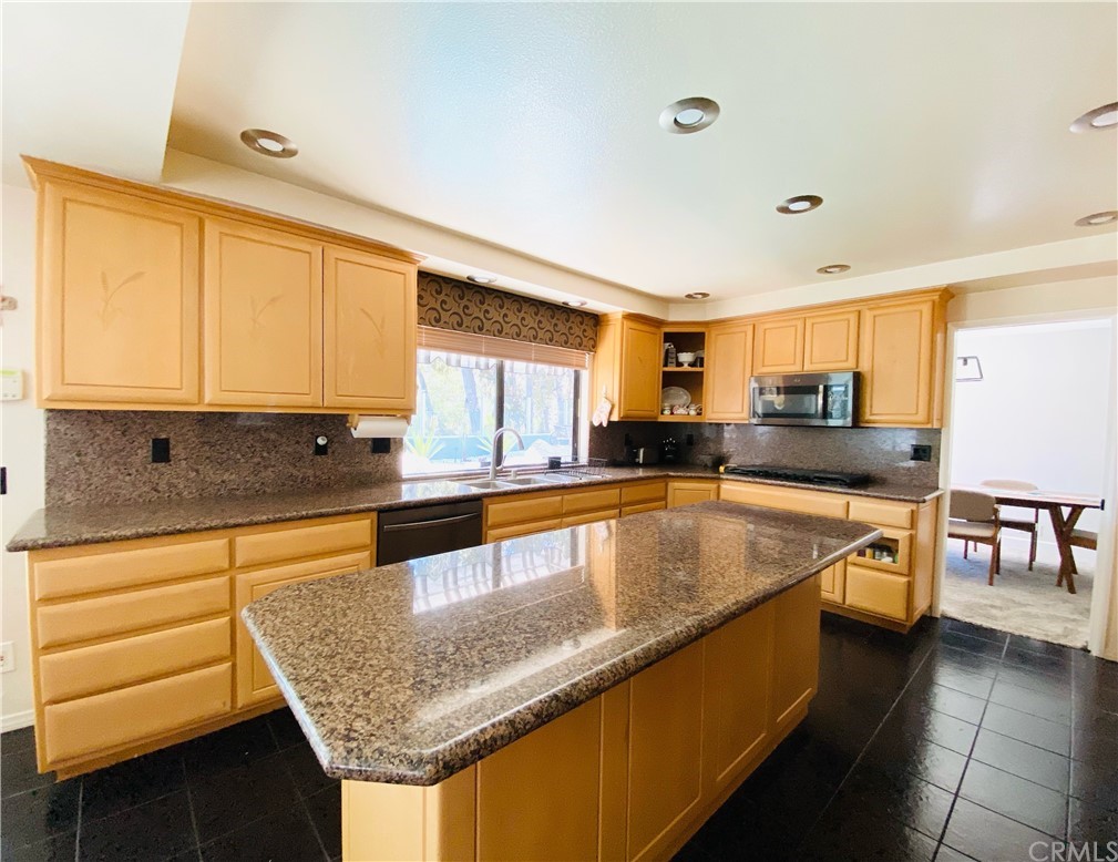 21901 Chaster Road Lake Forest, CA 92630 - Photo 11 of 33 Kitchen with varied storage cabinets