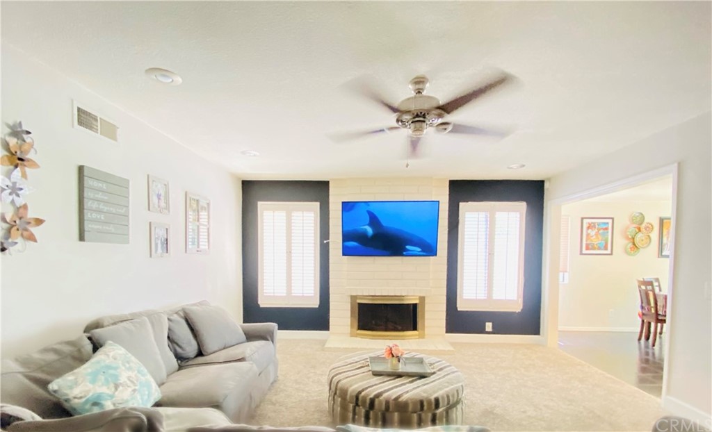 21901 Chaster Road Lake Forest, CA 92630 - Photo 14 of 33 Family Room - Fireplace and plenty of natural light