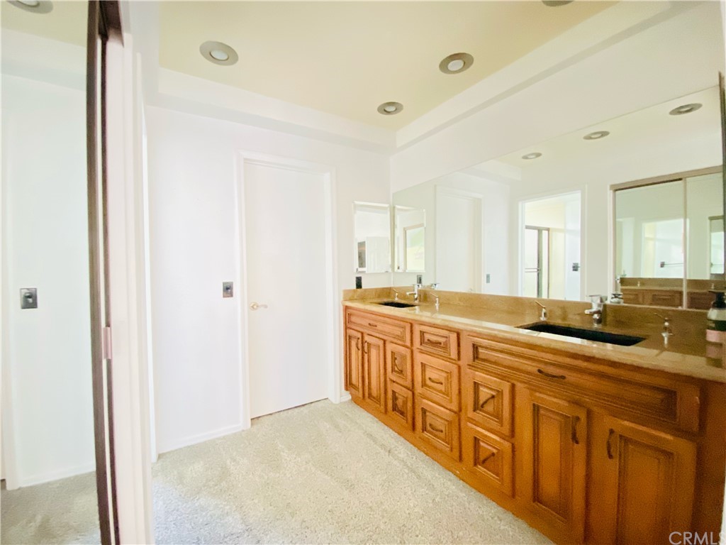21901 Chaster Road Lake Forest, CA 92630 - Photo 19 of 33 Main Bedroom Suite- Bathroom with dual sinks
