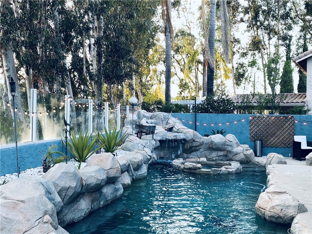 21901 Chaster Road Lake Forest, CA 92630 - Photo 27 of 33 Rock Pool with Spa and Waterfall