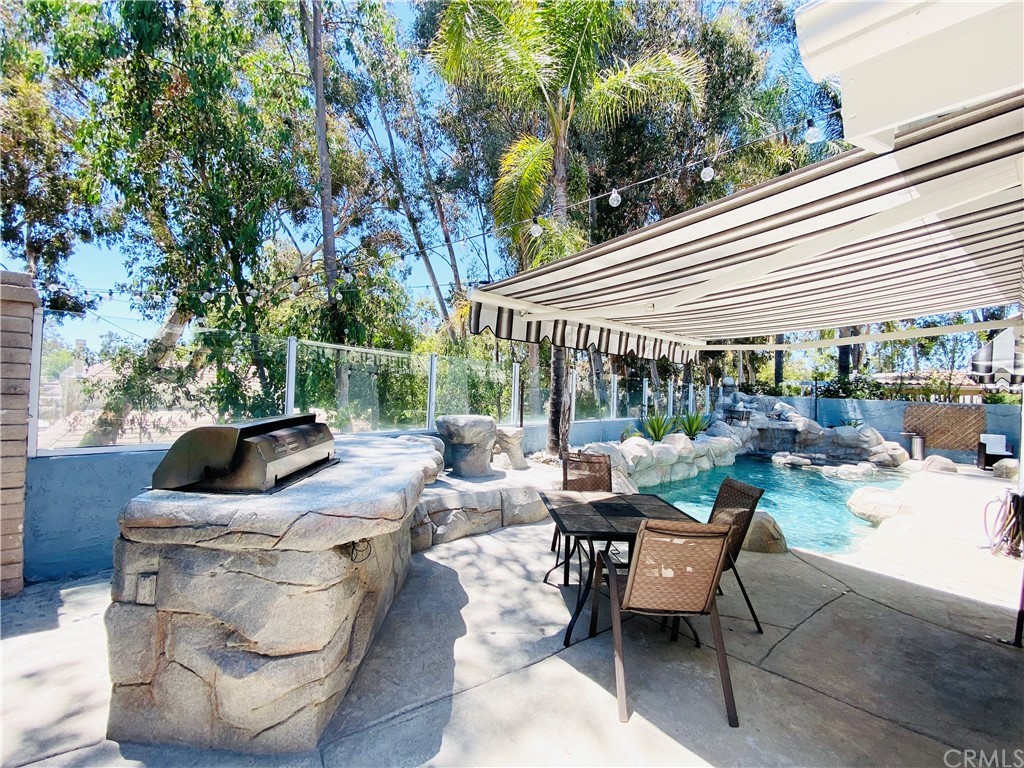 21901 Chaster Road Lake Forest, CA 92630 - Photo 31 of 33 Built-in Barbeque and patio area shaded by retractable awning (electric)