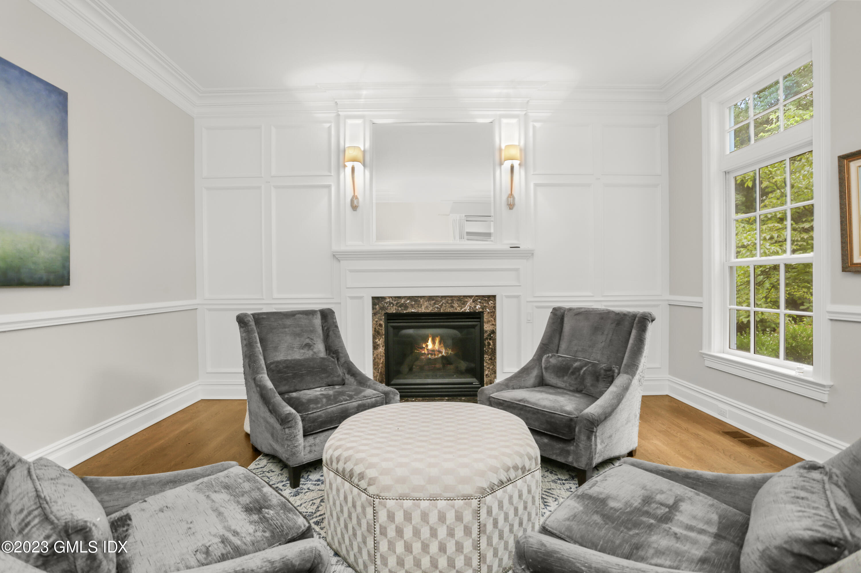 375 Stanwich Road Greenwich, CT 06830 - Photo 6 of 31 a living room with furniture and a fireplace