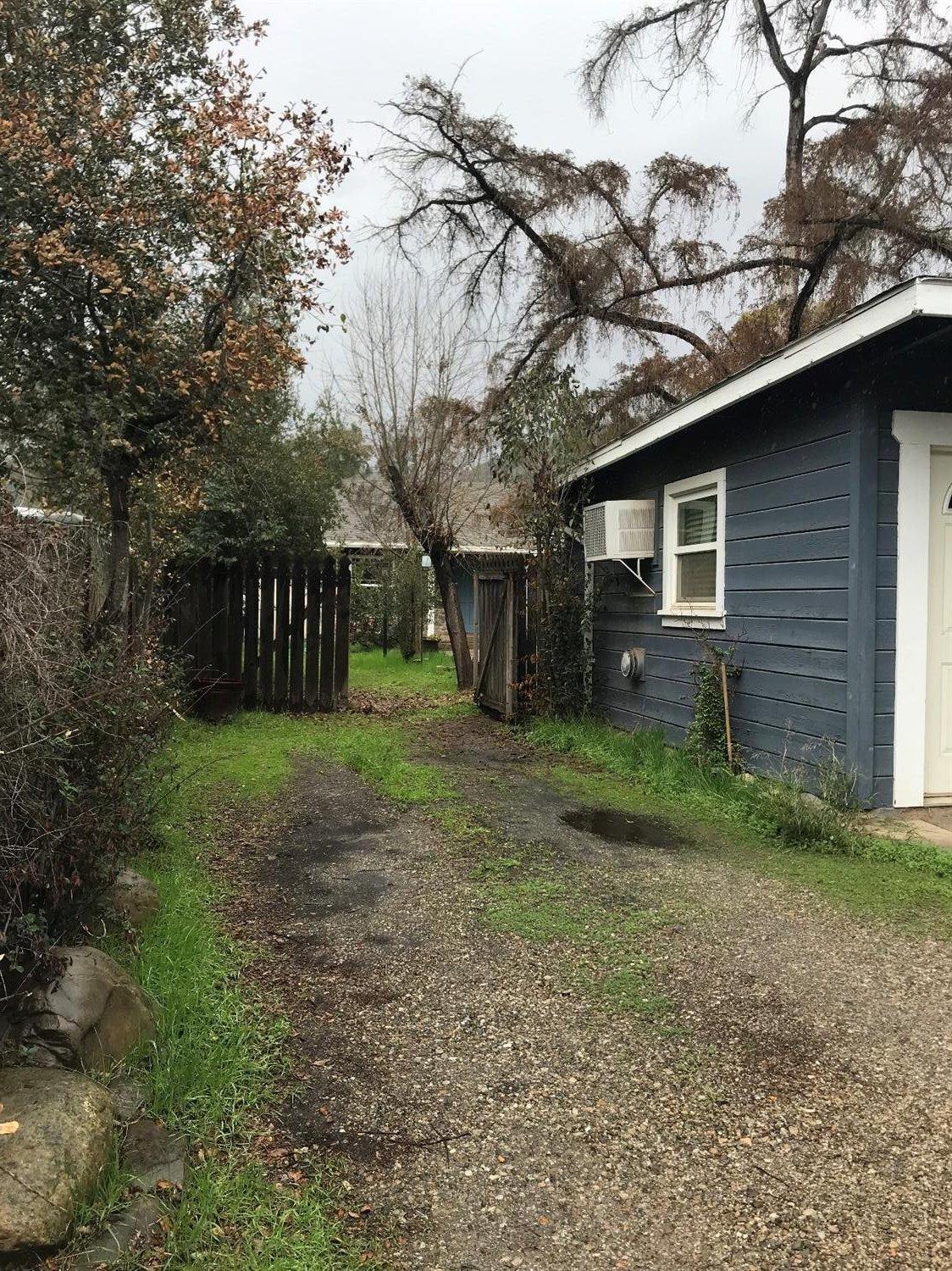 457 Burnham Road Oak View, CA 93022 - Photo 45 of 47 a view of a yard in front of a house with large tree