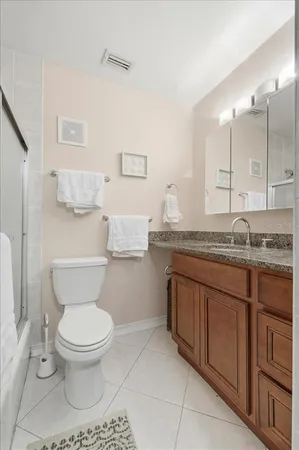 a view of swimming pool with an outdoor seating