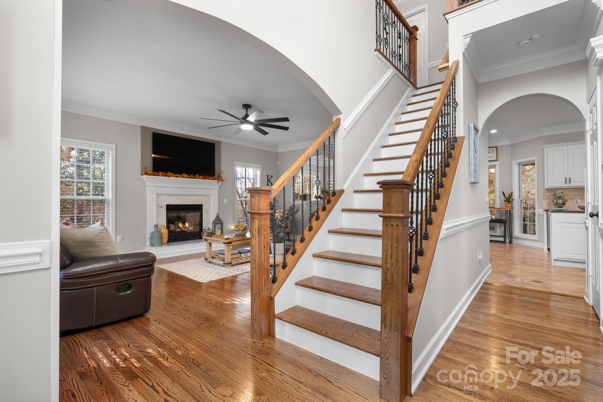 5665 Crown Terrace Hickory, NC 28601 - Photo 22 of 45 a living room with furniture fireplace and a flat screen tv