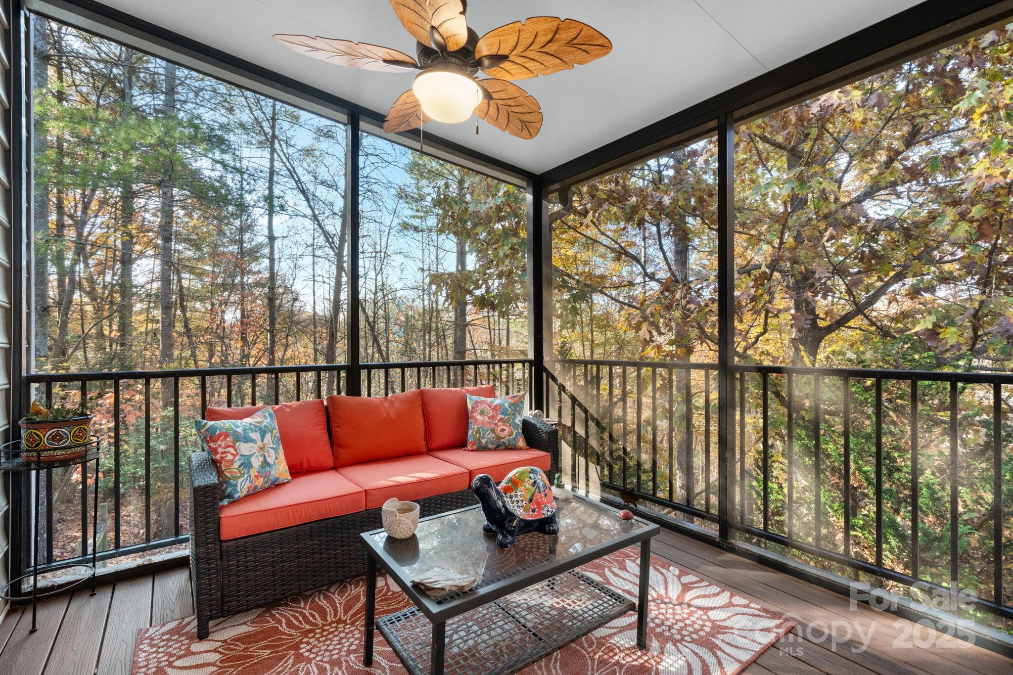 5665 Crown Terrace Hickory, NC 28601 - Photo 26 of 45 a roof deck with couch and wooden floor
