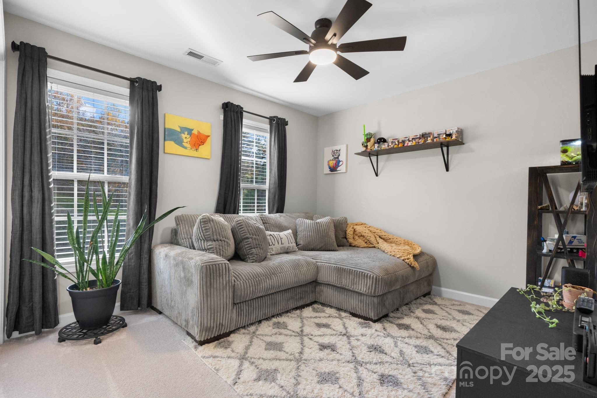 5665 Crown Terrace Hickory, NC 28601 - Photo 36 of 45 a living room with furniture and a window