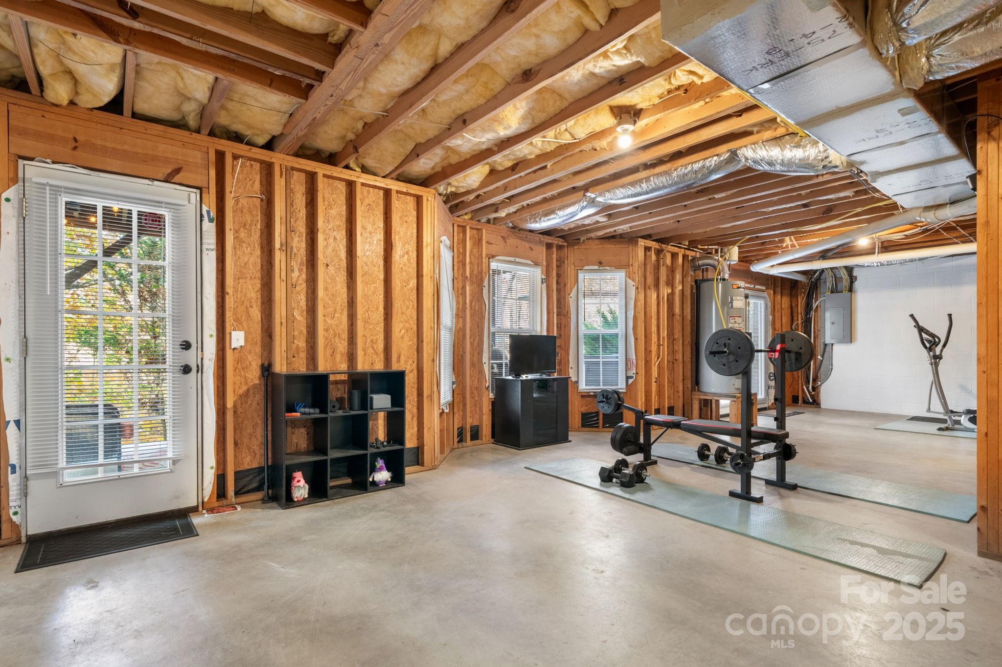 5665 Crown Terrace Hickory, NC 28601 - Photo 39 of 45 a view of a room with gym equipment and windows