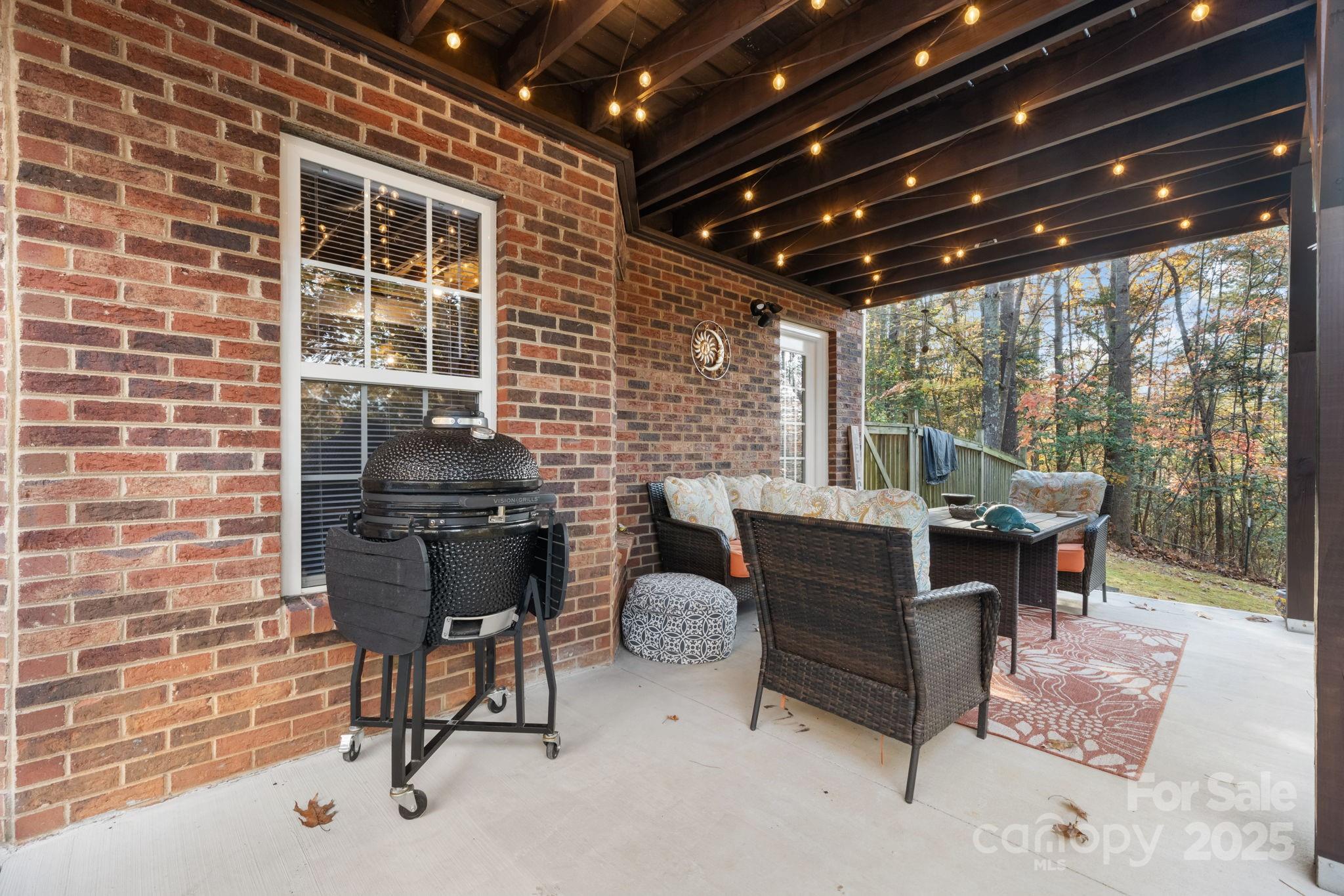 5665 Crown Terrace Hickory, NC 28601 - Photo 42 of 45 a outdoor living space with furniture and a grill