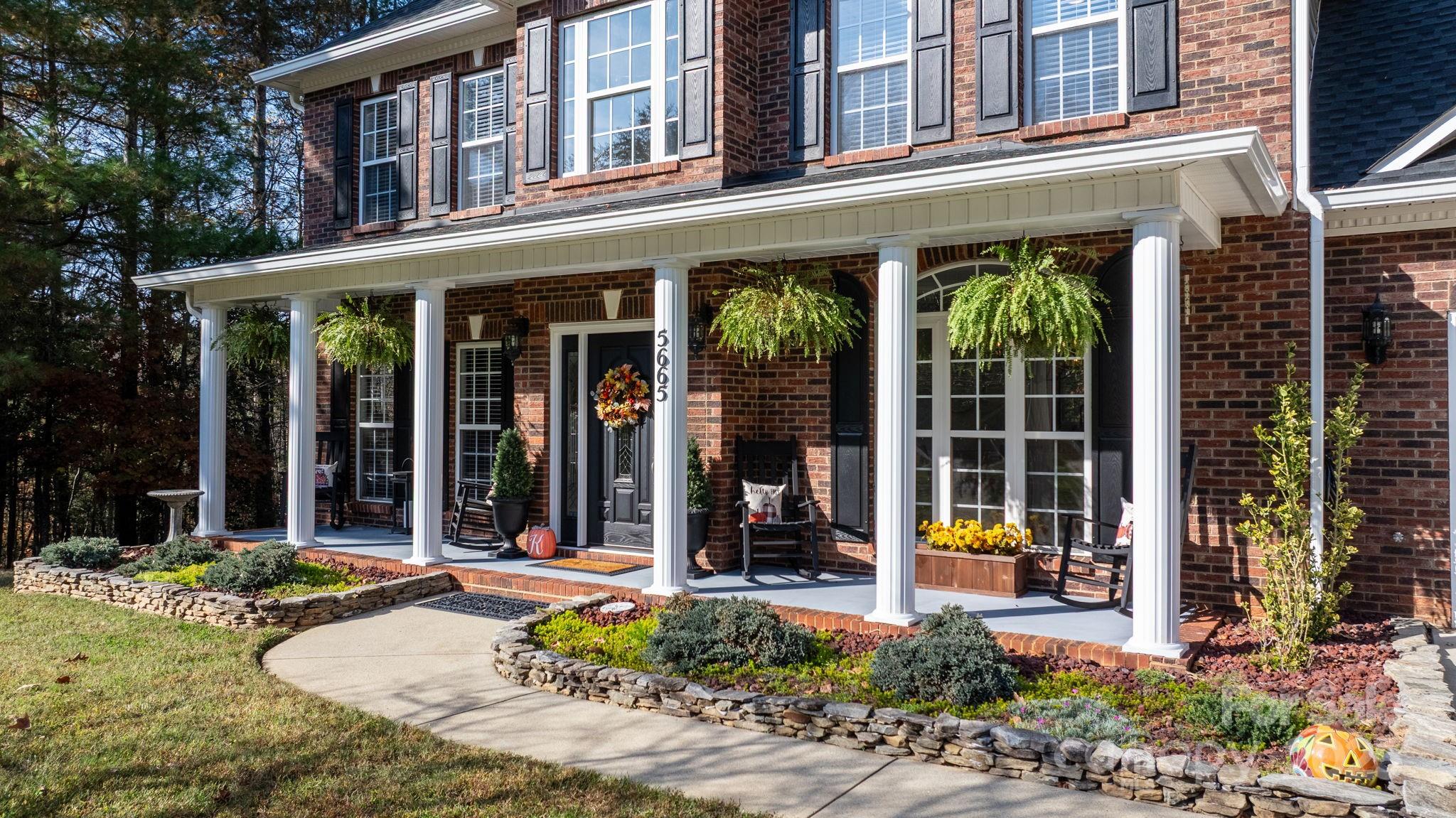 5665 Crown Terrace Hickory, NC 28601 - Photo 6 of 45 front view of a building with a porch