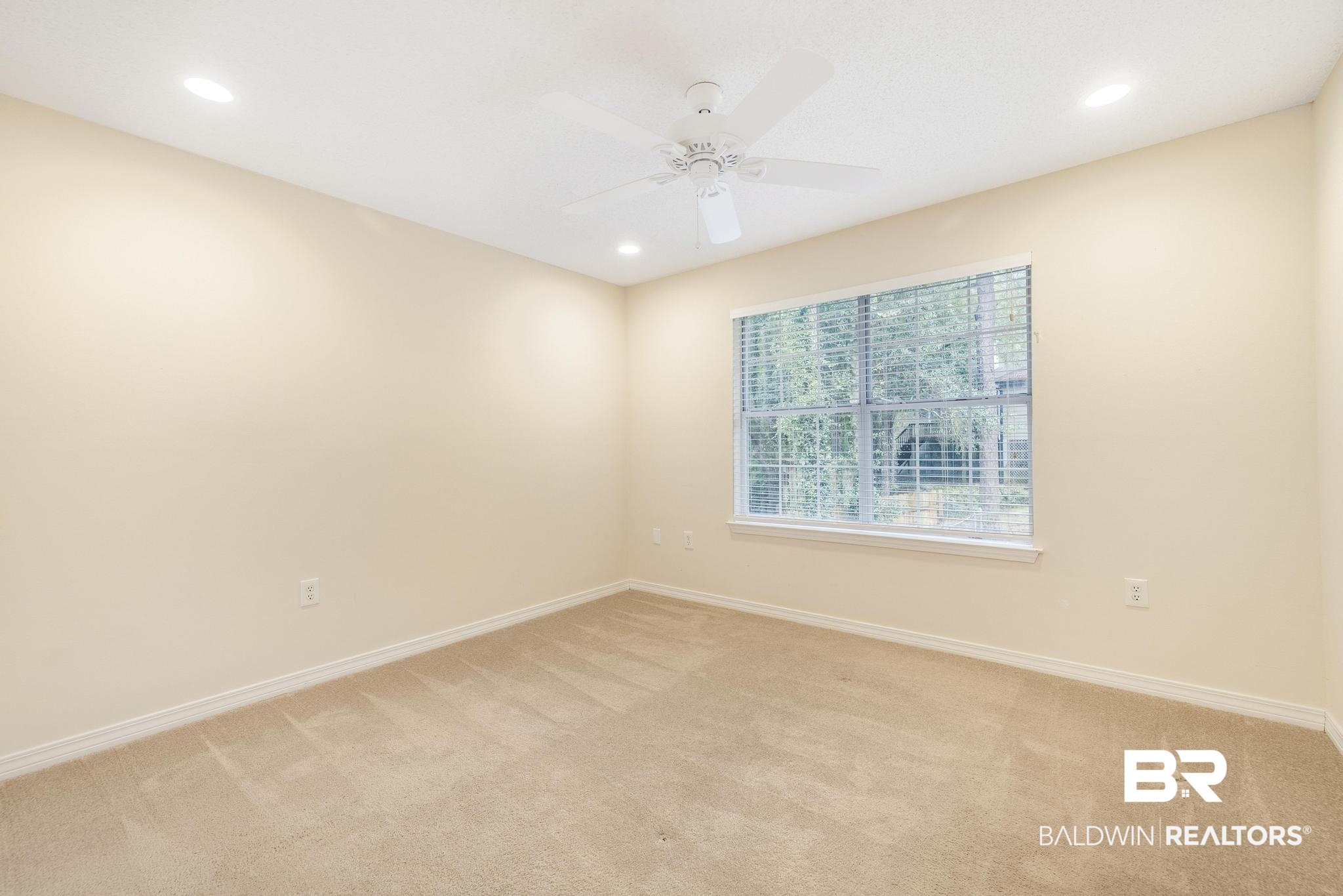 140 Hope Drive Daphne, AL 36526 - Photo 35 of 54 Empty room with light colored carpet, recessed lighting, and ceiling fan