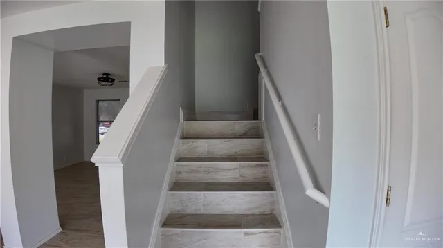 a view of staircase with white walls and white walls