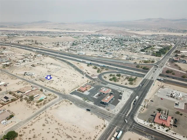 an aerial view of beach and ocean