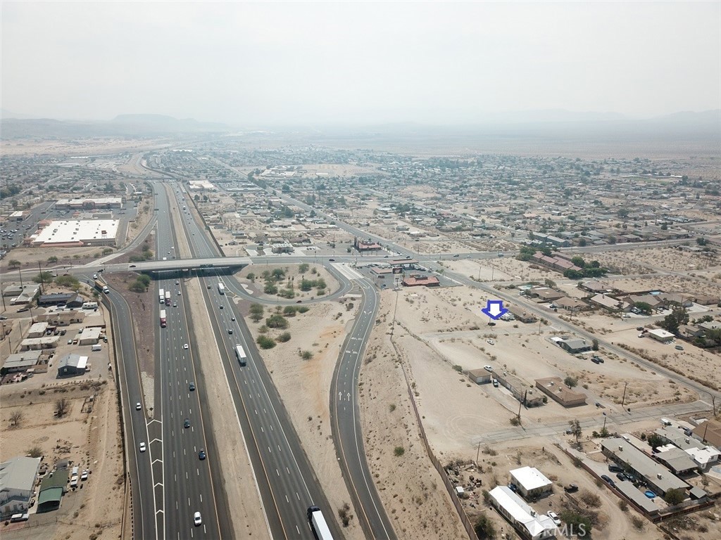 451 Armory Road Barstow, CA 92311 - Photo 7 of 9 an aerial view of residential houses with outdoor space
