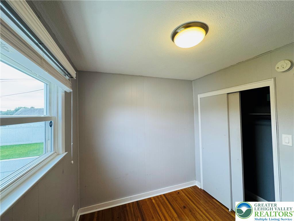1522 Elayne Street Bethlehem, PA 18017 - Photo 17 of 25 a view of a room with wooden floor and windows
