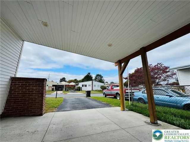 a view of a porch with furniture