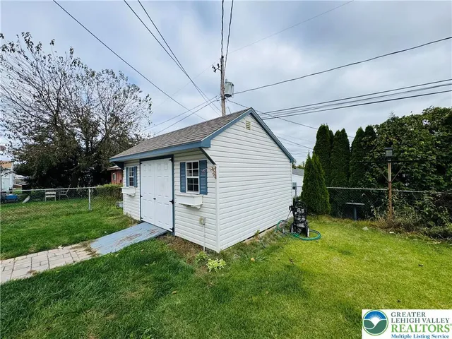 a view of backyard with green space