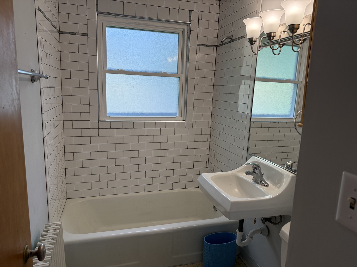 8 North Harrison Street Batavia, IL 60510 - Photo 18 of 22 a bathroom with a sink and bathtub