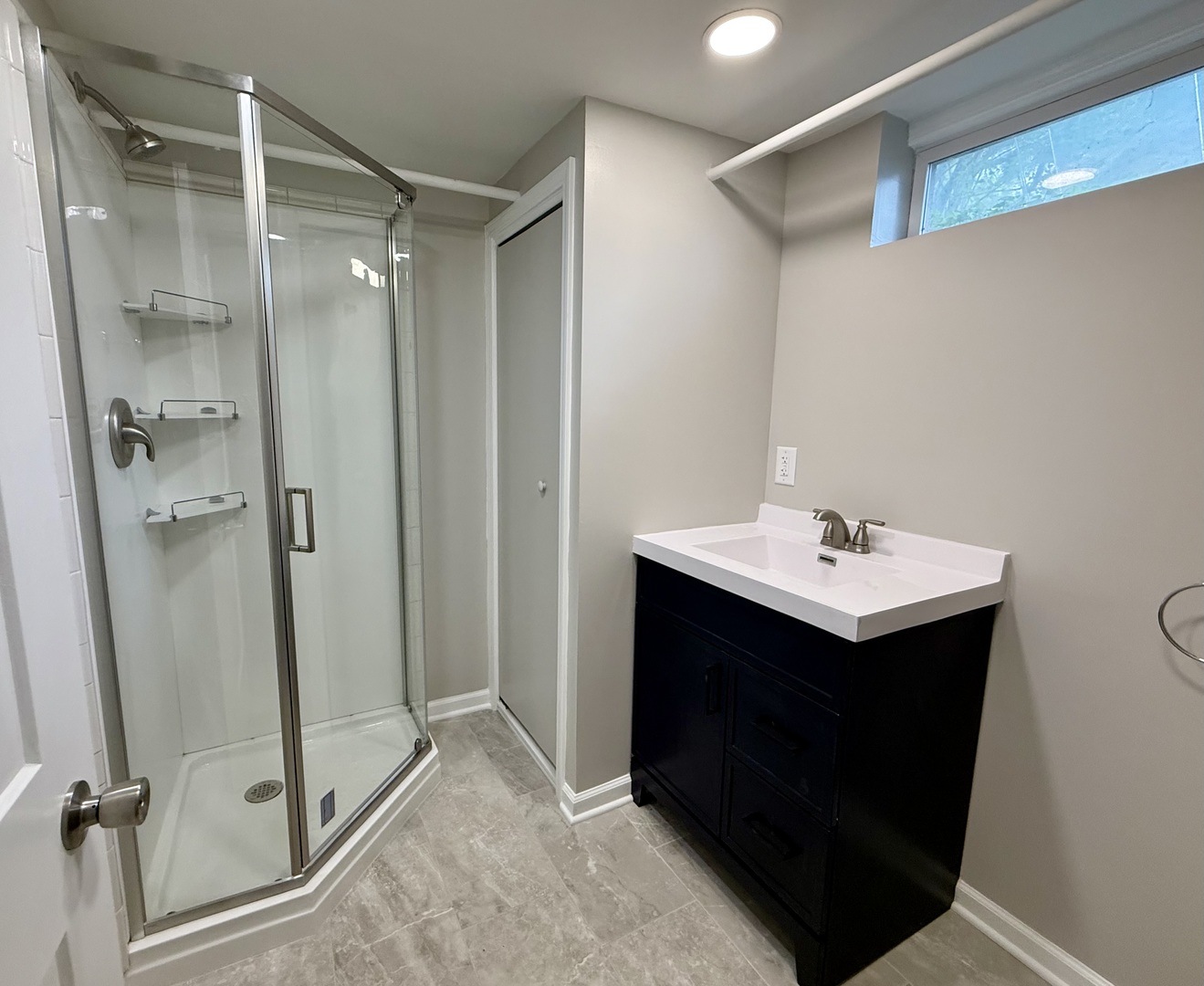 8 North Harrison Street Batavia, IL 60510 - Photo 19 of 22 a bathroom with a sink mirror and shower