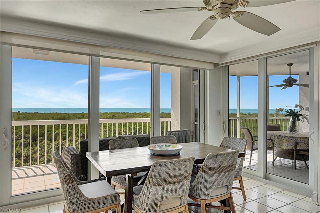 6573 Marissa Loop, Unit 703 Naples, FL 34108 - Photo 4 of 38 Dining Area with access to both Patios