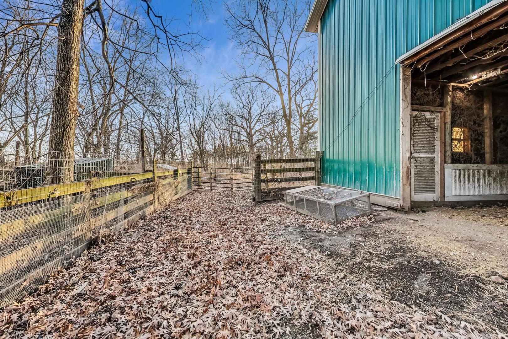3316 Millstream Road Marengo, IL 60152 - Photo 54 of 62 a backyard of a house with lots of green space